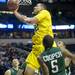 Michigan sophomore Jordan Morgan takes the ball to the hoop during the first half of the second round of the NCAA tournament at Bridgestone Arena in Nashville, Tenn.  Melanie Maxwell I AnnArbor.com